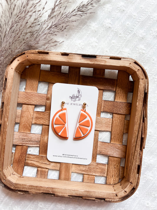 The Orange Slice Dangles